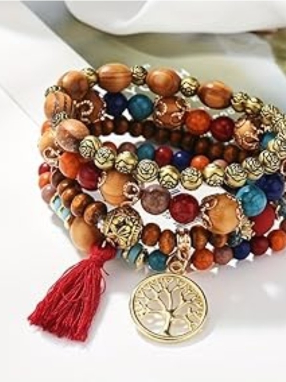 Bohemian Multi-Strand Beaded Bracelet Stack with Red Tassel